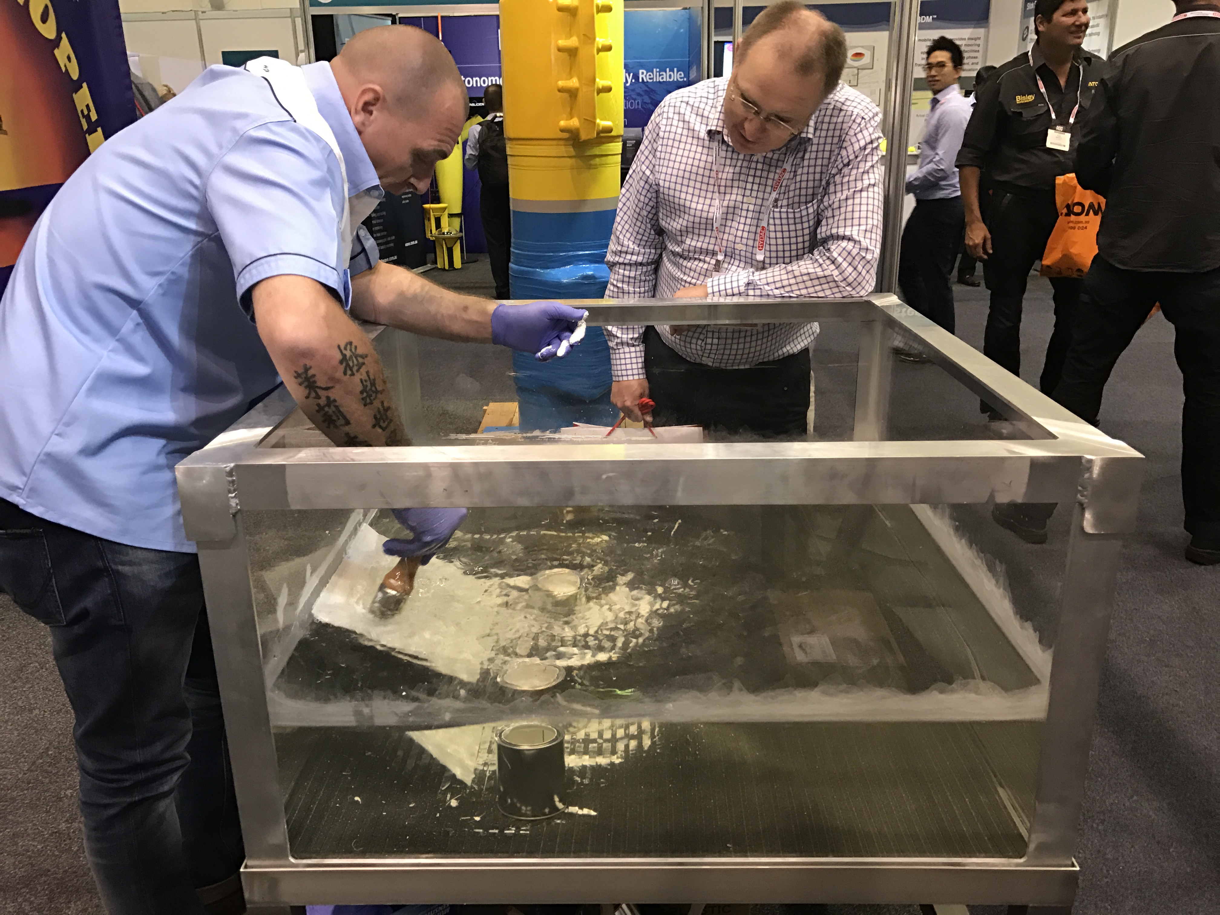 A demonstration at the Australian Oil & Gas Expo of Alocit being applied under water