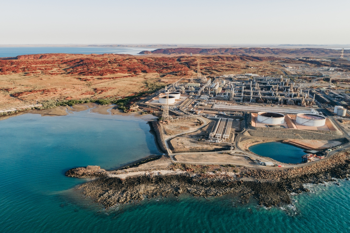 Woodside's half-year profit slips