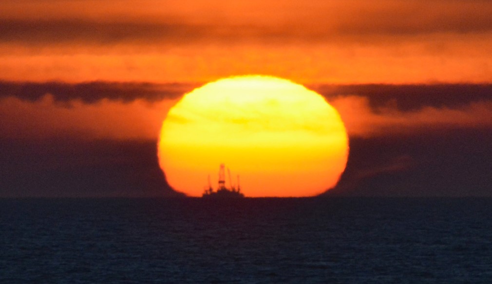 Illustration; Rig at sunrise ONGC COVID-19