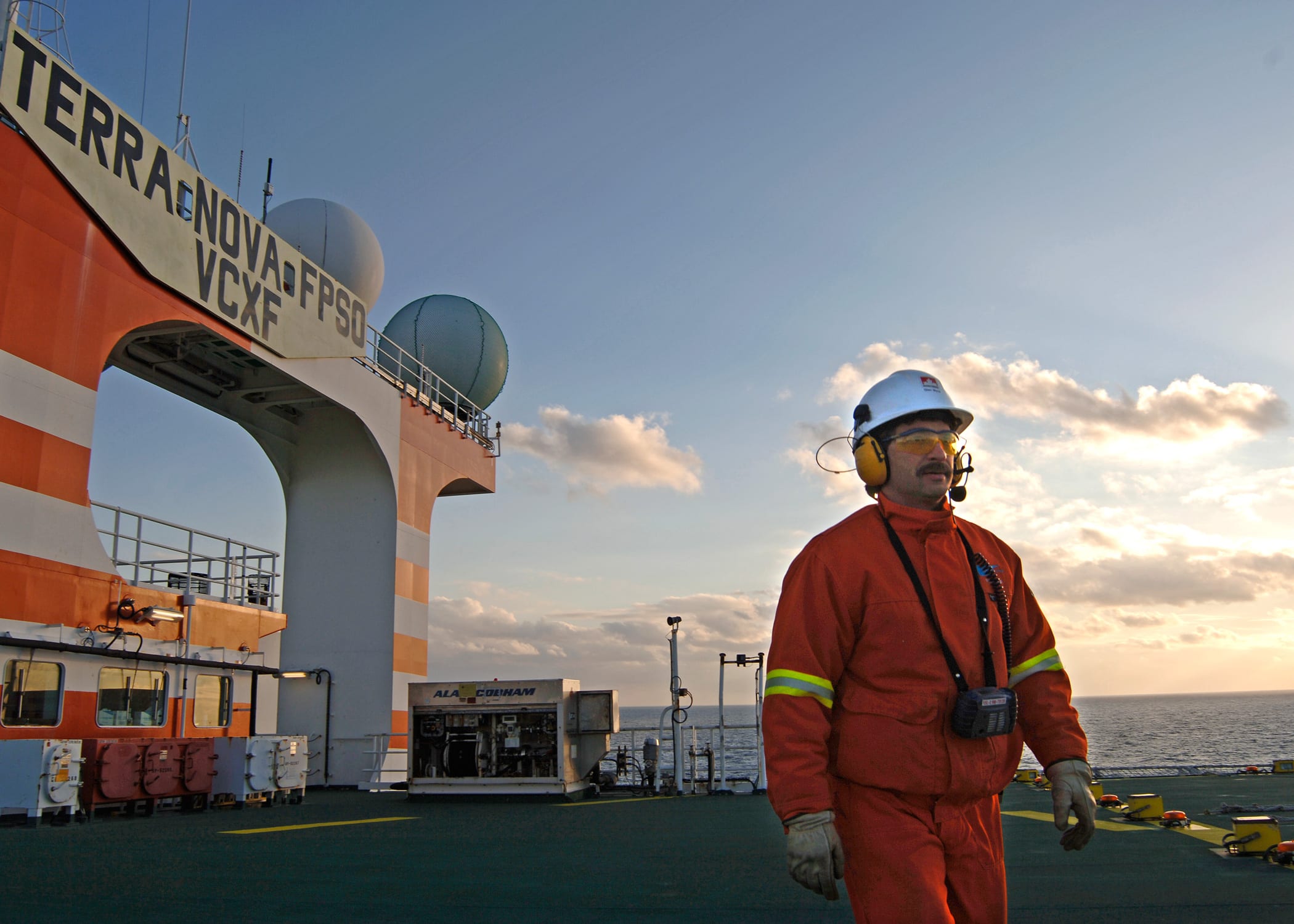 Man walking on helicopter pad on Terra Nova FPSO