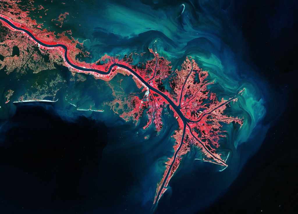 Image showing Mississipi River Delta. Osmotic power is extracted from the difference in the salt concentration when river fresh water meets sea water, which naturally occurs in river deltas. (Courtesy of Sweetch Energy/Image by European Space Agency)