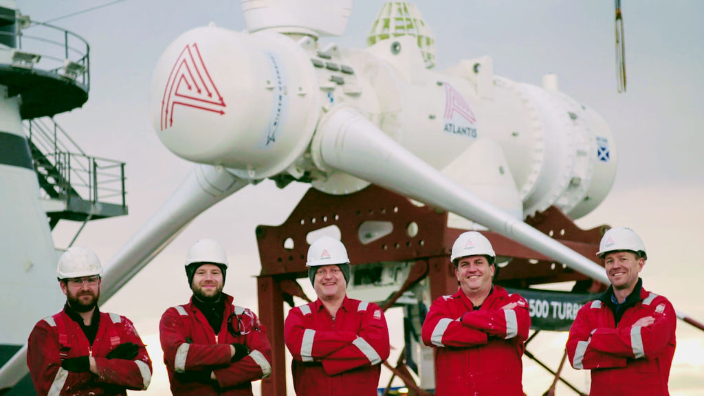 Photo showing SIMEC Atlantis’ team in front of MeyGen’s AR1500 tidal turbine (Courtesy of SIMEC Atlantis Energy)