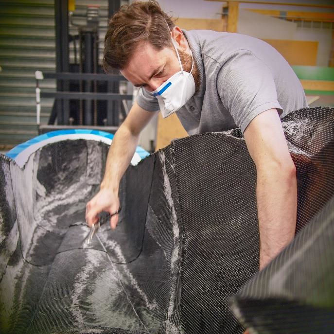 Photo showing the lay-up of multi-axial composite material (Courtesy of ACS-A)