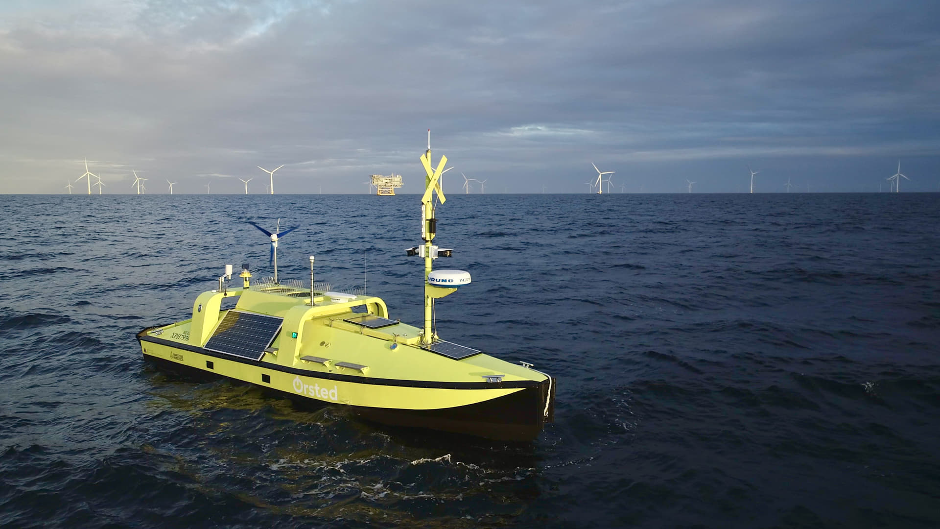 A photo of Ørsted's Hugin uncrewed surface vessel (USV) prototype at sea