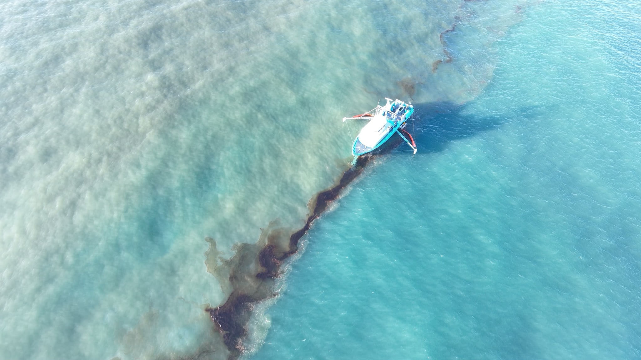 A Clean Gulf Associates 95-foot response vessel skims crude oil approximately 4 miles southeast of South Pass Louisiana, Nov. 17, 2023; Source: U.S. Coast Guard, courtesy Clean Gulf Associates