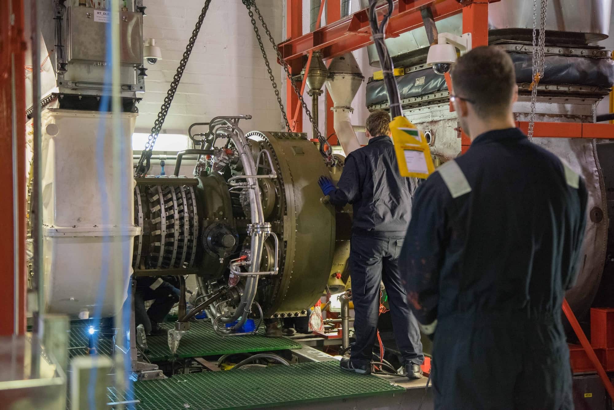 EthosEnergy teammates working on a gas turbine; Courtesy of EthosEnergy