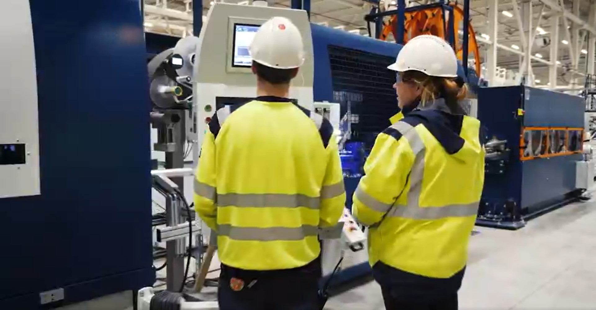 TKF workers producing the first power cores in its new cable factory in Eemshaven