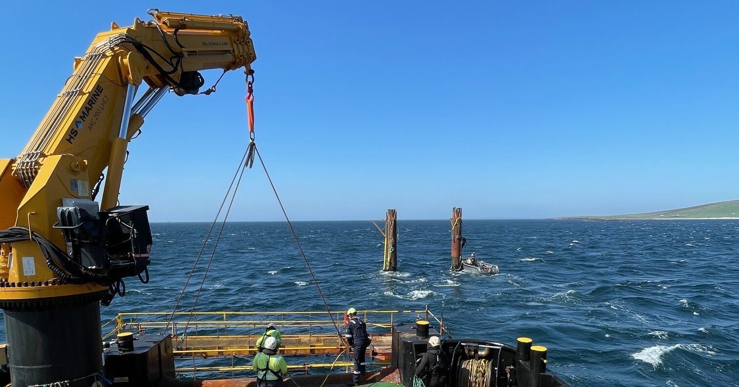 OpenHydro structure removed, crane holding walkway against bow