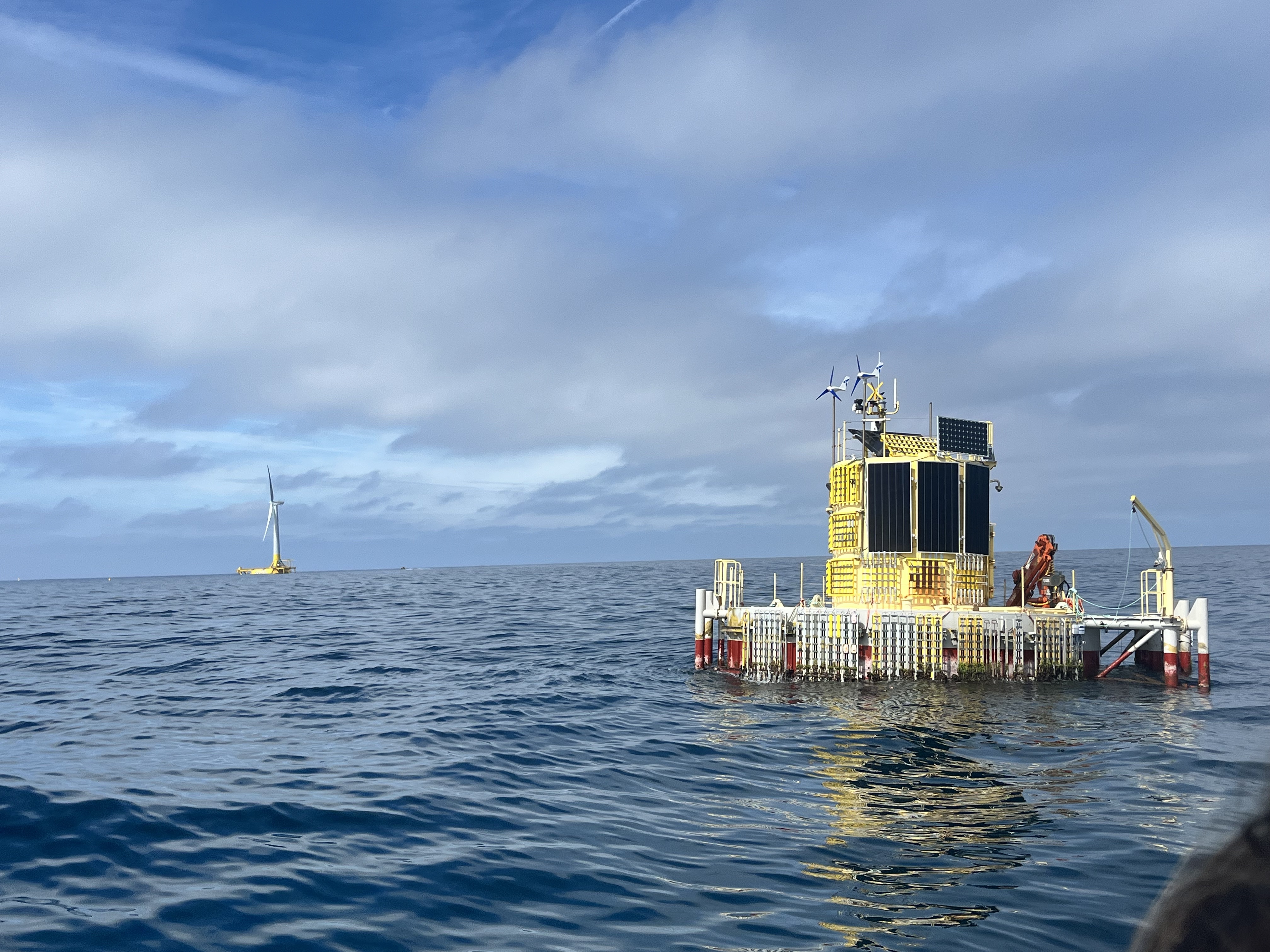 CETO will be deployed at a site between SAITEC’s DemoSATHoffshore wind turbine (back left) and Tecnalia’s HarshLab (front right).