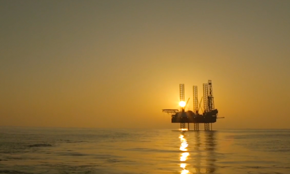 Offshore platform at sunset