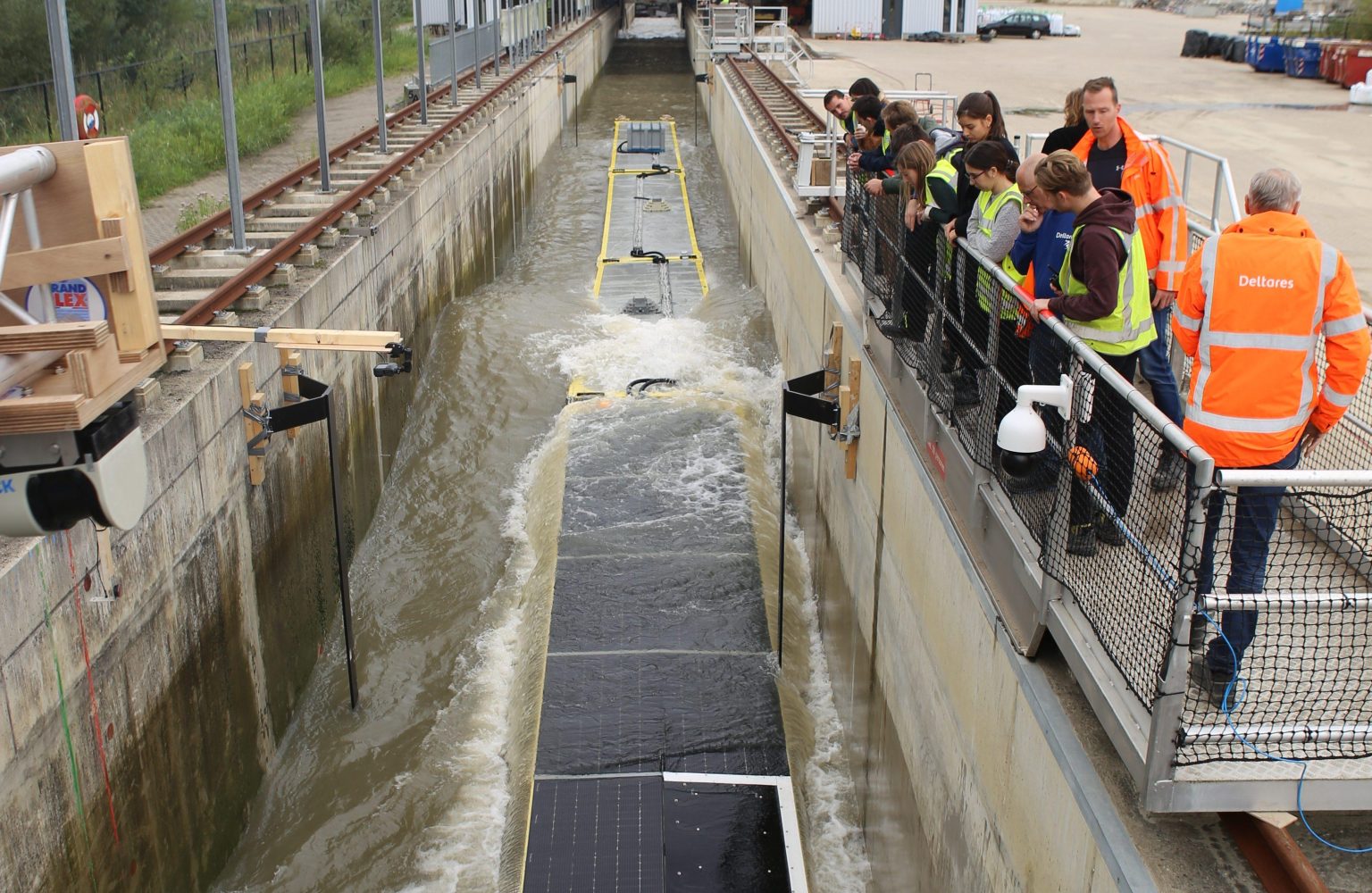 tests of an array of floaters of offshore solar in the Delta Flume. Source: Deltares