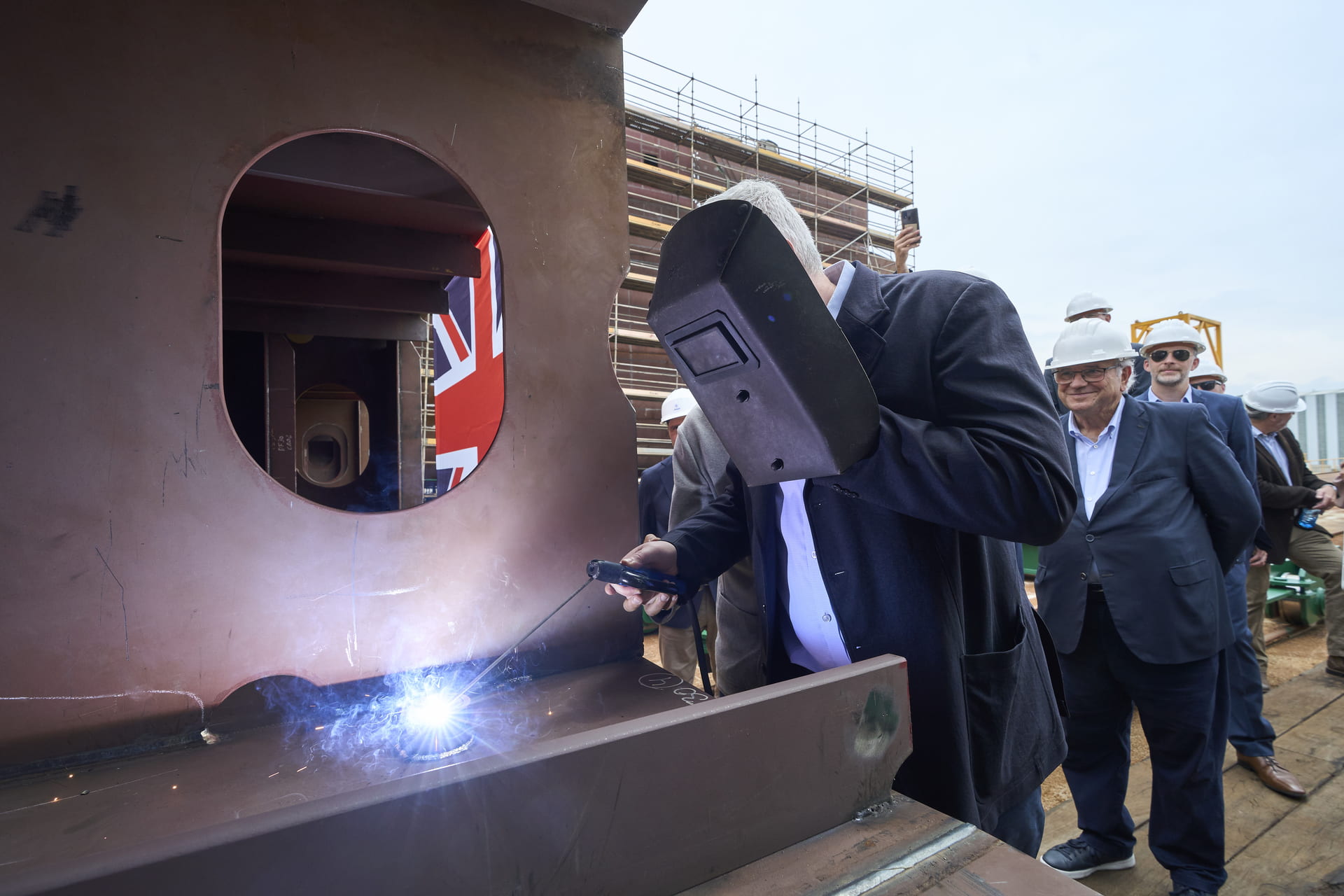 Bibby Line Group CEO Jonathan Lewis welding a coin into the keel plates of its first eCSOV