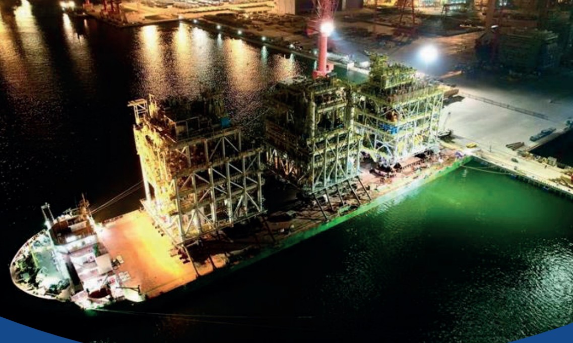 A large vessel at dock at night